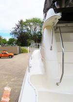 TRUSTEE'S SALE BY PUBLIC AUCTION - 2004 SEA RAY 480 SEDAN BRIDGE SPORT YACHT Auction Photo