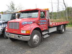 1993 Int'l. 4700, Century 21' Ramp Body Auction Photo