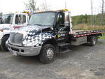 2005 Int'l. 4300, Chevron HD Series 14 Ramp Body Auction Photo