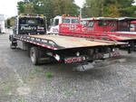 2005 Int'l. 4300, Chevron HD Series 14 Ramp Body Auction Photo