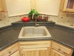 LAMINATE COUNTERTOP, SWANSTONE SINK Auction Photo