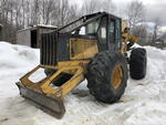2003 JD 648GIII Grapple Skidder Auction Photo