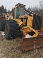 LOT 5 - 1991 JD 748E GRAPPLE SKIDDER Auction Photo