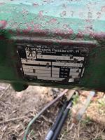 1999 JOHN DEERE 6110 4WD TRACTOR Auction Photo