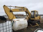 1990 JOHN DEERE 590D HYDRAULIC EXCAVATOR Auction Photo