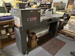 LOT 22 - BESLER SHRINK PACKAGING MACHINE Auction Photo