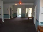 60,000+/- SF Development Property ~ 5.2+/- Acres ~ Former Viking Nursing Care Facility Auction Photo