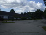 60,000+/- SF Development Property ~ 5.2+/- Acres ~ Former Viking Nursing Care Facility Auction Photo