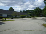 60,000+/- SF Development Property ~ 5.2+/- Acres ~ Former Viking Nursing Care Facility Auction Photo