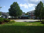 60,000+/- SF Development Property ~ 5.2+/- Acres ~ Former Viking Nursing Care Facility Auction Photo