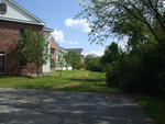 60,000+/- SF Development Property ~ 5.2+/- Acres ~ Former Viking Nursing Care Facility Auction Photo