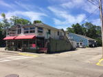 Parcel #1: C-Store - Diner - Apts. - Gas StationParcel #2: Restaurant - Apts. - Laundromat Auction Photo