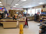 Full Service Grocery Store w/ Apartment Auction Photo