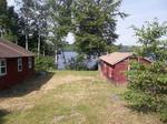 Glimmerglass Lodge 3+/-Acres - 342+/- Ft. Lake Frontage  (4) Rustic Cabins Auction Photo