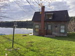 Lakefront Cottage  100+/- ft. Frontage Auction Photo