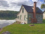Lakefront Cottage  100+/- ft. Frontage Auction Photo