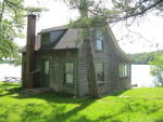 Lakefront Cottage  100+/- ft. Frontage Auction Photo