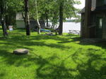 Lakefront Cottage  100+/- ft. Frontage Auction Photo