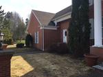 6,628+/-SF Brick Colonial Revival Auction Photo