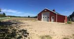 313+/- Acre Farm w/Barns - 2015 Custom Home w/10+/- Acres Auction Photo