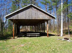 25.8+/- Acres, 9,120+/-SF Lodge Building, Pavilion, Bath House, Waterfront Auction Photo