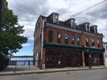 7,687+/-SF Mixed - Use Brick Building -  Water Views - .10+/- Acres  Auction Photo