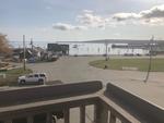 7,004+/-SF Coml/Restaurant Bldg Deck & Harbor Views  Auction Photo