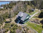 Classic Maine Summer Cottage ~ Oceanfront on Eggemoggin Reach Auction Photo