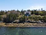 Classic Maine Summer Cottage ~ Oceanfront on Eggemoggin Reach Auction Photo