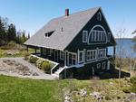 Classic Maine Summer Cottage ~ Oceanfront on Eggemoggin Reach Auction Photo
