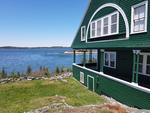 Classic Maine Summer Cottage ~ Oceanfront on Eggemoggin Reach Auction Photo