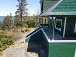 Classic Maine Summer Cottage ~ Oceanfront on Eggemoggin Reach Auction Photo