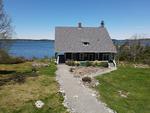 Classic Maine Summer Cottage ~ Oceanfront on Eggemoggin Reach Auction Photo