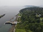 Pier, Ramp, Float, Fish House, 1.85+/- Acres,  209+/- Shorefront on Lowells Cove Auction Photo