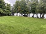 LAKEFRONT ~ 13,534+/-SF Waterfront Estate on Long Lake  Auction Photo