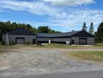 15,816+/-SF New Construction Mixed-Use Building  1.5+/- Acres Auction Photo