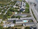 Sea Latch Inn 82-Room Lodging Complex - Ocean Views 2+/- Acres - Across From Long Sands Beach Auction Photo
