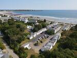 Sea Latch Inn 82-Room Lodging Complex - Ocean Views 2+/- Acres - Across From Long Sands Beach Auction Photo